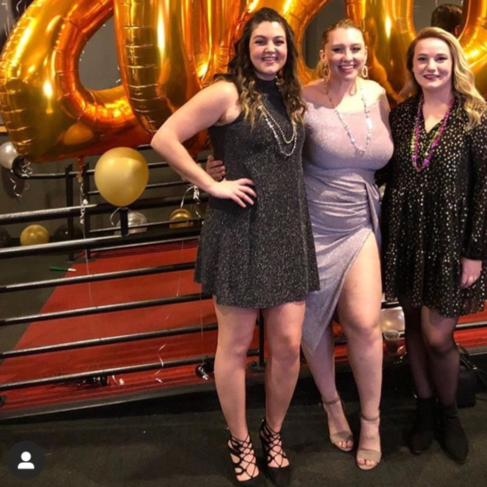 Sparkly black sleeveless mock neck cocktail dress